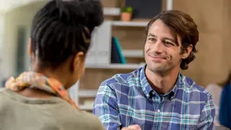 two people engaging in discussion