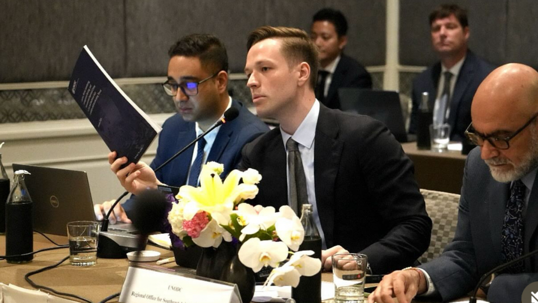 Wojcik presenting at a panel