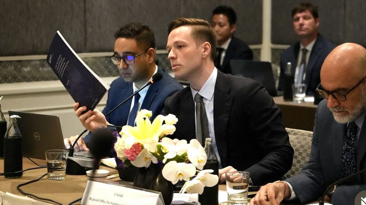 Wojcik presenting at a panel